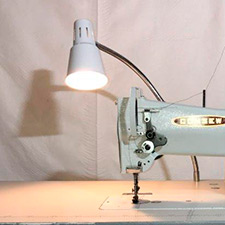 table lamp illuminates operators workspace